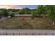 Aerial view of the horse pasture, showing fencing, a horse, and plenty of room to roam, showing country property at 7130 Independence St, Arvada, CO 80004