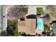 Aerial view of a residential property with a private pool, well-manicured lawns, and a spacious driveway at 7552 Miller Ct, Arvada, CO 80005