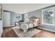 Bright bedroom with new windows, neutral walls and modern decor at 2729 E Geddes Pl, Centennial, CO 80122
