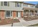 Inviting front exterior with a cozy porch and meticulously kept garden at 2729 E Geddes Pl, Centennial, CO 80122