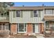 Charming two-story townhouse with brick accents and well-maintained landscaping at 2729 E Geddes Pl, Centennial, CO 80122