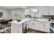 Stylish kitchen featuring modern countertops, sleek cabinets, and stainless steel appliances at 2729 E Geddes Pl, Centennial, CO 80122