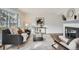 Sun-filled living room featuring modern decor, comfortable seating, and a cozy atmosphere at 2729 E Geddes Pl, Centennial, CO 80122
