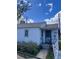 Exterior shot of single story home with white siding and small front yard at 3816 W Dakota Ave, Denver, CO 80219