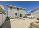 Spacious concrete backyard with a basketball hoop, perfect for outdoor recreation at 20530 Randolph Pl, Denver, CO 80249