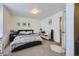 Cozy bedroom features carpet, a comfortable bed, and ample natural light at 20530 Randolph Pl, Denver, CO 80249