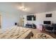 Large bedroom featuring carpeted floors, and a desk at 20530 Randolph Pl, Denver, CO 80249