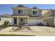 Charming two-story home with a well-maintained front yard and a two-car garage. Perfect for families! at 20530 Randolph Pl, Denver, CO 80249