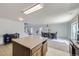 This kitchen features tile floors, a kitchen island, and dining room area at 20530 Randolph Pl, Denver, CO 80249