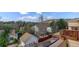 Lovely home's backyard featuring mature trees and a wooden deck area, offering great outdoor living space at 1460 Quince Ave # 102, Boulder, CO 80304