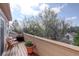 Spacious balcony with seating area and scenic views of lush greenery at 1460 Quince Ave # 102, Boulder, CO 80304