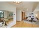 Spacious bedroom featuring light hardwood floors, neutral decor, and a large window at 1460 Quince Ave # 102, Boulder, CO 80304