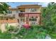 Backyard exterior with deck, greenery, and trellis at 1460 Quince Ave # 102, Boulder, CO 80304