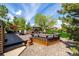Backyard deck with built-in seating and firepit at 10037 Allison Ct, Broomfield, CO 80021
