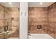 Clean bathroom with a shower and bathtub at 10037 Allison Ct, Broomfield, CO 80021