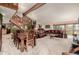 Open dining area with hardwood floors and rustic wooden table at 10037 Allison Ct, Broomfield, CO 80021