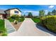 Long driveway leading to a two-car garage at 10037 Allison Ct, Broomfield, CO 80021