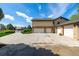 Three-car garage with ample space for parking at 10037 Allison Ct, Broomfield, CO 80021