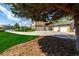Three-car attached garage with landscaping at 10037 Allison Ct, Broomfield, CO 80021