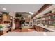 Bright kitchen with an island, wood cabinets, and stainless steel appliances at 10037 Allison Ct, Broomfield, CO 80021