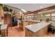 Large kitchen with an island, wooden cabinets, and ample counter space at 10037 Allison Ct, Broomfield, CO 80021