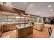 Spacious kitchen with island, wood cabinets, and granite countertops at 10037 Allison Ct, Broomfield, CO 80021