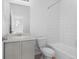 Clean full bathroom with a single sink vanity and tub-shower combination at 1697 S Andes Way, Aurora, CO 80017