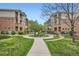 Well-maintained condo complex with lush green spaces, walking paths, and inviting communal areas at 8083 W 51St Pl # 203, Arvada, CO 80002