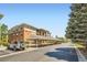Exterior view featuring covered parking with ample space and convenient access to the condo building at 8083 W 51St Pl # 203, Arvada, CO 80002