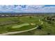 Panoramic aerial view of the golf course and surrounding neighborhood homes at 13132 Pennsylvania Cir, Thornton, CO 80241