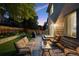 Cozy backyard patio with outdoor seating and grill, perfect for entertaining at 13132 Pennsylvania Cir, Thornton, CO 80241