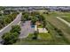 Landscaped community amenities feature a playground, basketball court, parking and green spaces for outdoor enjoyment at 13132 Pennsylvania Cir, Thornton, CO 80241