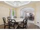 Dining room featuring a round table with decorative chairs and chandelier lighting at 13132 Pennsylvania Cir, Thornton, CO 80241