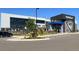 Modern exterior of Topgolf features ample parking, pedestrian walkways, and landscaping around building at 13132 Pennsylvania Cir, Thornton, CO 80241