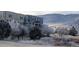 Beautiful condo exterior showcasing the neighborhood and the frosted winter landscape at 911 Laramie Blvd # B, Boulder, CO 80304