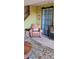Relaxing seating area with a leather armchair, sliding barn door and stylish accents at 911 Laramie Blvd # B, Boulder, CO 80304
