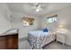 Bright bedroom features two windows, gray carpet, and a white-painted wall at 3451 Highland Pl, Westminster, CO 80031