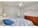 Bright bedroom features two windows, gray carpet, and a white-painted wall at 3451 Highland Pl, Westminster, CO 80031