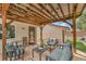 Relax on the covered deck with ample seating, perfect for outdoor gatherings at 3451 Highland Pl, Westminster, CO 80031