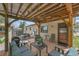 Covered deck features ample seating and plenty of room for entertaining guests at 3451 Highland Pl, Westminster, CO 80031