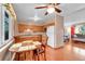 Eat-in kitchen features a wooden table set, matching cabinets, and stainless steel appliances at 3451 Highland Pl, Westminster, CO 80031