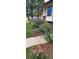 Landscaping with purple flowers and a nice walkway to the home at 3451 Highland Pl, Westminster, CO 80031