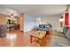 Bright living room showcasing an open layout and seamless flow to dining area at 3451 Highland Pl, Westminster, CO 80031