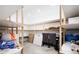 Large basement storage space with bright lighting and custom shelving and storage solutions at 924 Glen Oaks Ave, Castle Pines, CO 80108