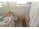 Bathroom featuring a single sink, toilet, and a bathtub at 1631 W Canal Cir # 832, Littleton, CO 80120