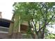 Charming condo featuring double balconies with brick and siding exterior accents at 1631 W Canal Cir # 832, Littleton, CO 80120