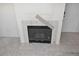 Close-up of the living room fireplace and the damaged ceiling at 1631 W Canal Cir # 832, Littleton, CO 80120