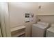 Laundry room with washer, dryer, shelving and decor at 1631 W Canal Cir # 832, Littleton, CO 80120