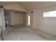 Bright living room features a cozy fireplace and damaged ceiling at 1631 W Canal Cir # 832, Littleton, CO 80120
