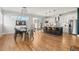 Modern kitchen and dining area with stylish lighting and countertops at 5240 N Raleigh St, Denver, CO 80212